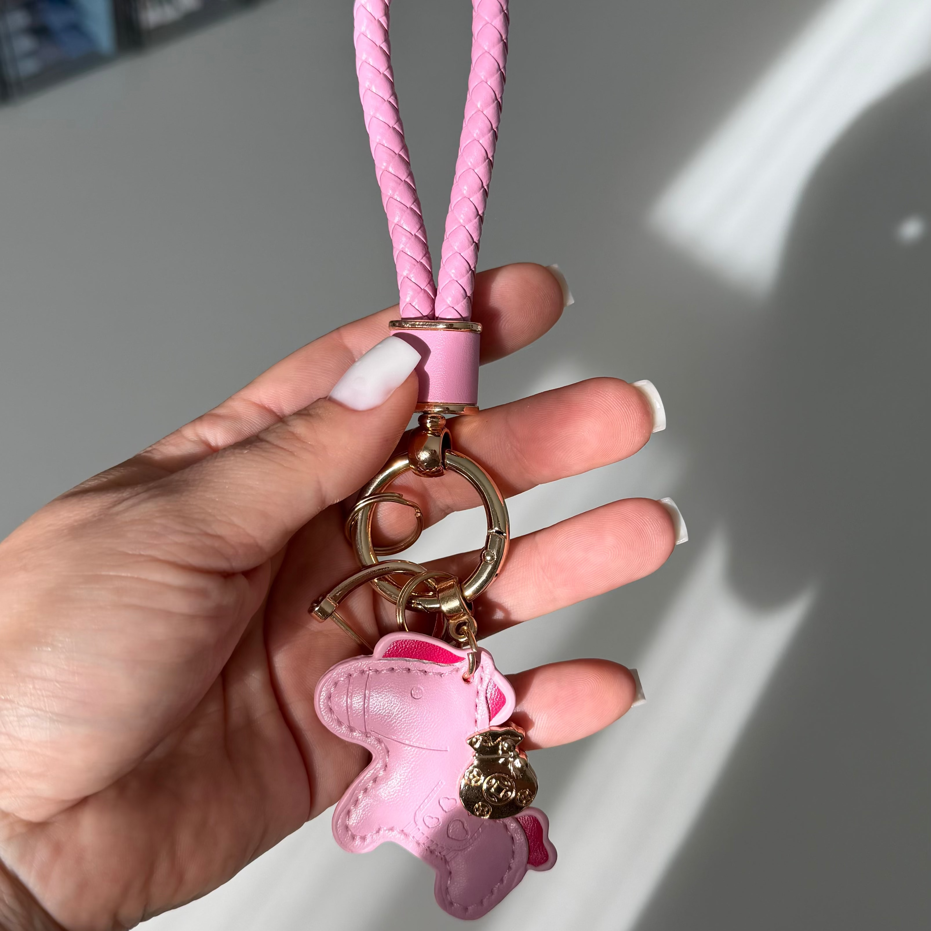 Pink pony bag charm keychain with matching braided strap