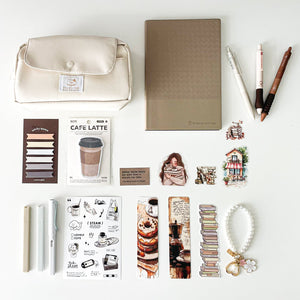 Morning Coffee Stationery Gift Bundle featuring a beige pencil pouch, A5 notebook, coffee-themed stationery, sticky notes, bookmarks, stickers, pens, highlighters and pearl keychain for book lovers and journal lovers.