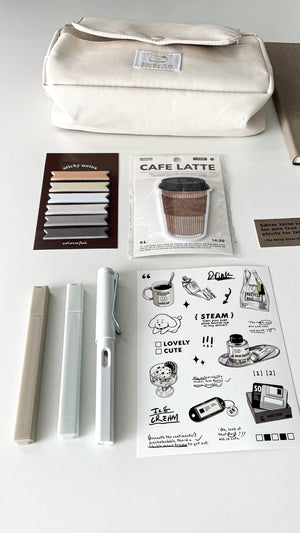 Morning Coffee Stationery Gift Bundle details including a beige pencil pouch, cream stationery, Café Latte memo pad, sticky notes, highlighter, eternal pencil and coffee-themed stickers.