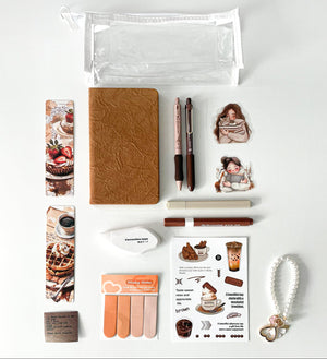 Basic coffee stationery gift bundle featuring an A6 notebook, clear pencil pouch, coffee gel pens, acrylic marker, highlighter, bookmarks, stickers, sticky notes, and pearl keychain charm.