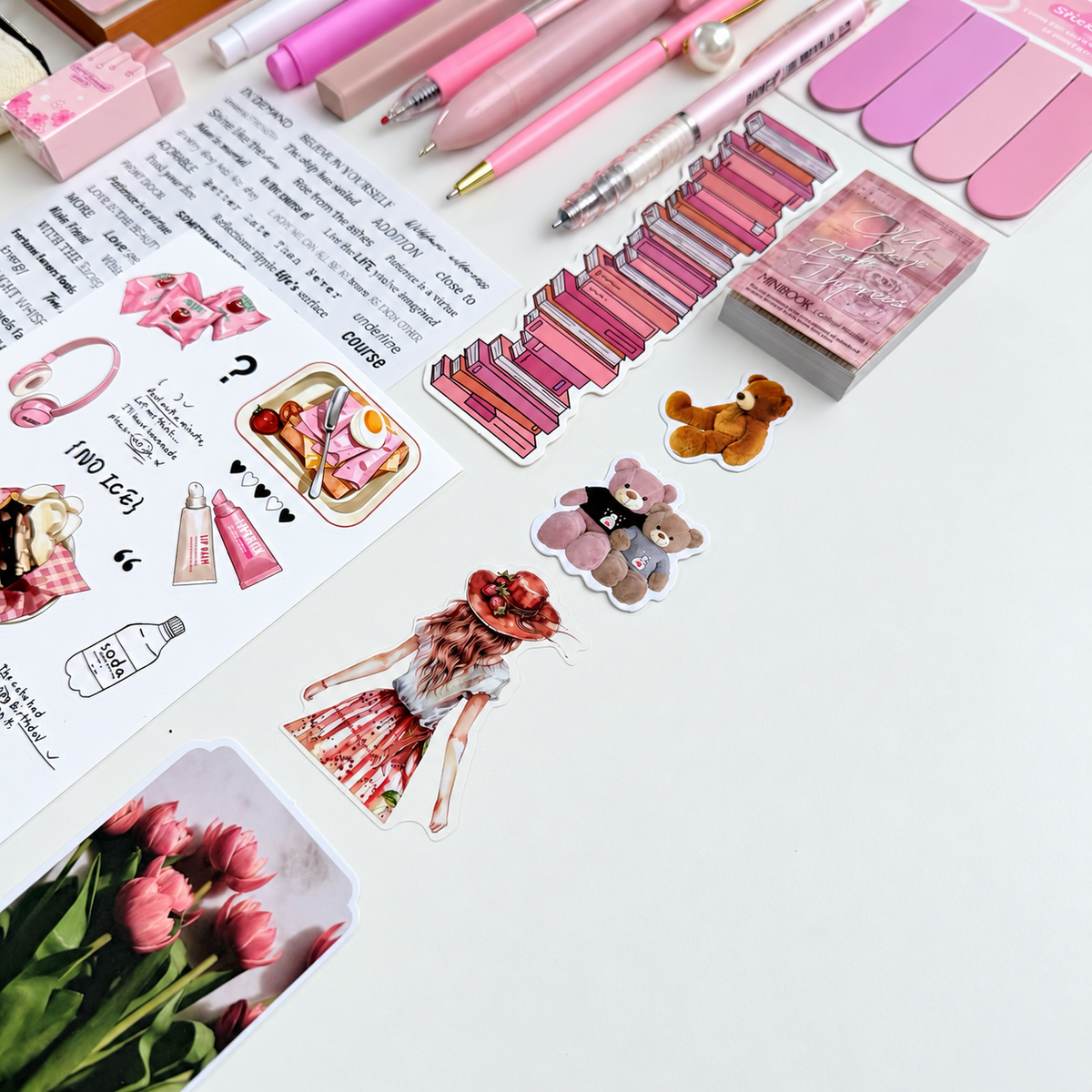 Pink journaling sticker sheets with decorative phrases, books, teddy bears and cute illustrations for scrapbooking and notebook decoration.