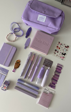 Top view of the Essential Purple Stationery Gift Bundle with matching pastel stationery and lavender pencil pouch