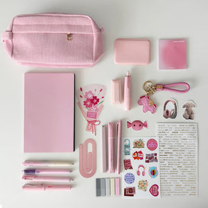Pink Stationery Gift Bundle featuring a corduroy pencil pouch, notebook journal, pastel pens, sticky notes, bookmarks, stickers, keychain charm, and cute desk accessories for book lovers and journaling. Bookish gift set.