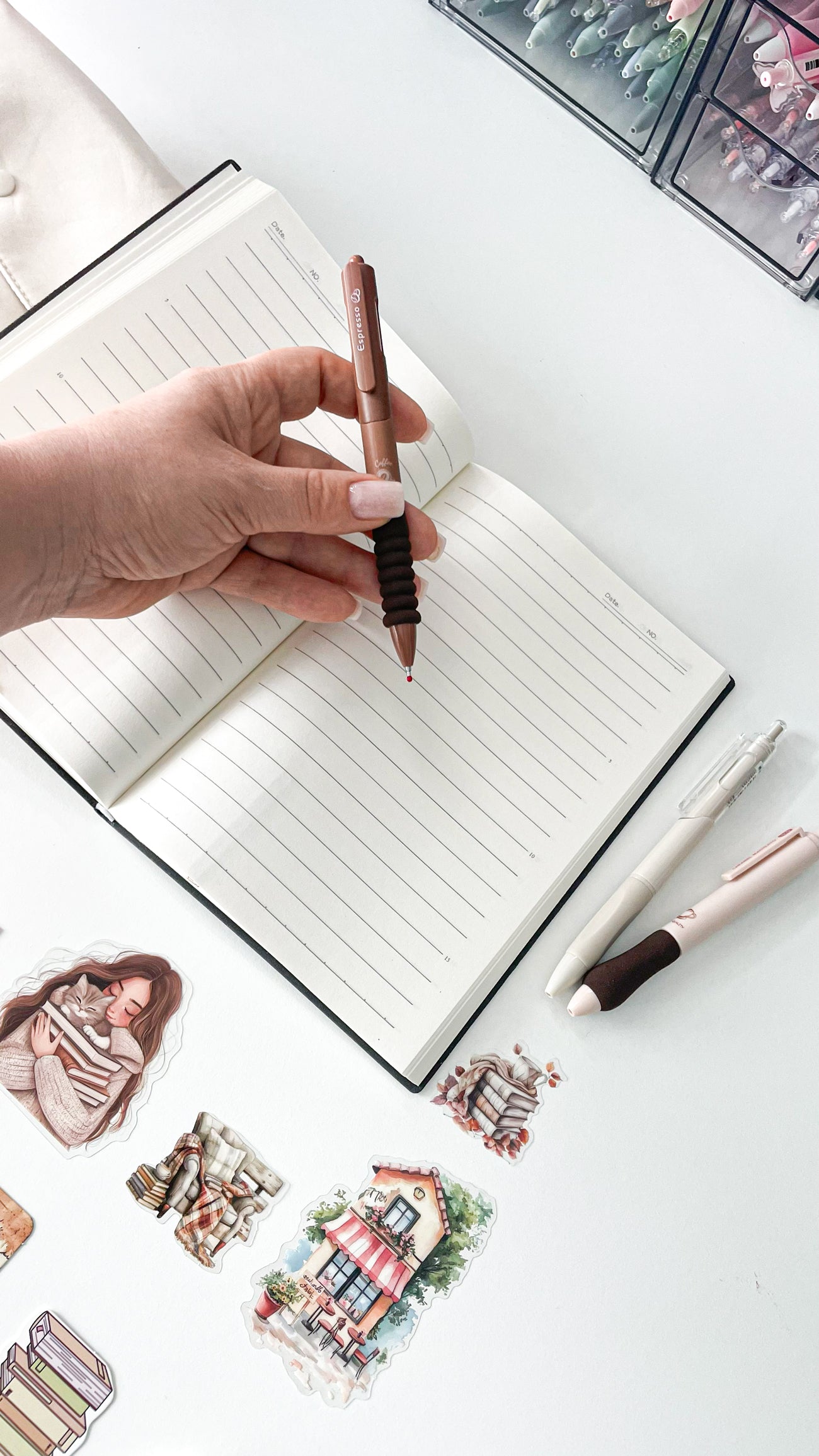 Cozy journaling setup with an A5 notebook, coffee-themed pens and bookish stickers from the Morning Coffee Stationery Gift Bundle.