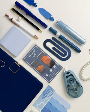 Blue stationery gift for sister with pens, highlighters, sticky notes, bookmarks and aesthetic accessories for journaling and reading.