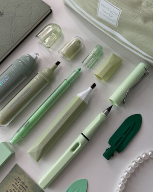 Sage green pens, glitter pen and highlighters from the Sage Garden stationery gift bundle. 🌿
