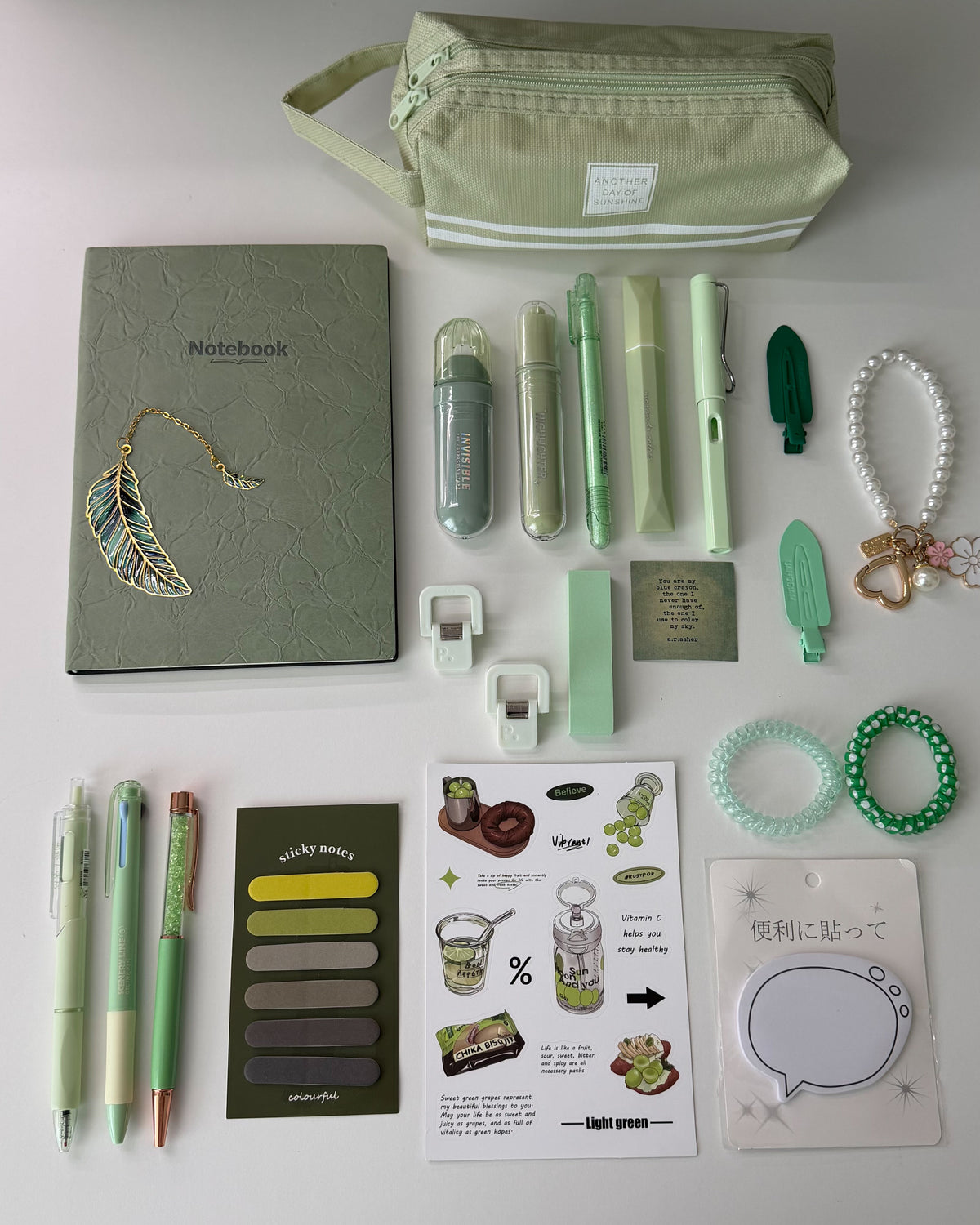 Sage Garden green stationery gift set with notebook, pencil pouch, pens, highlighters, sticky notes, bookmarks, stickers and accessories.