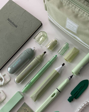 Sage green stationery gift for a coworker with notebook, pens, highlighters and pencil pouch.