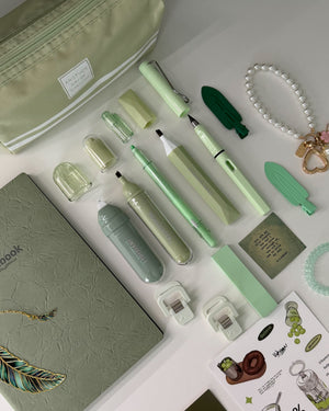 Sage green stationery gift for her with notebook, pencil pouch, pens, highlighters and bookish accessories.